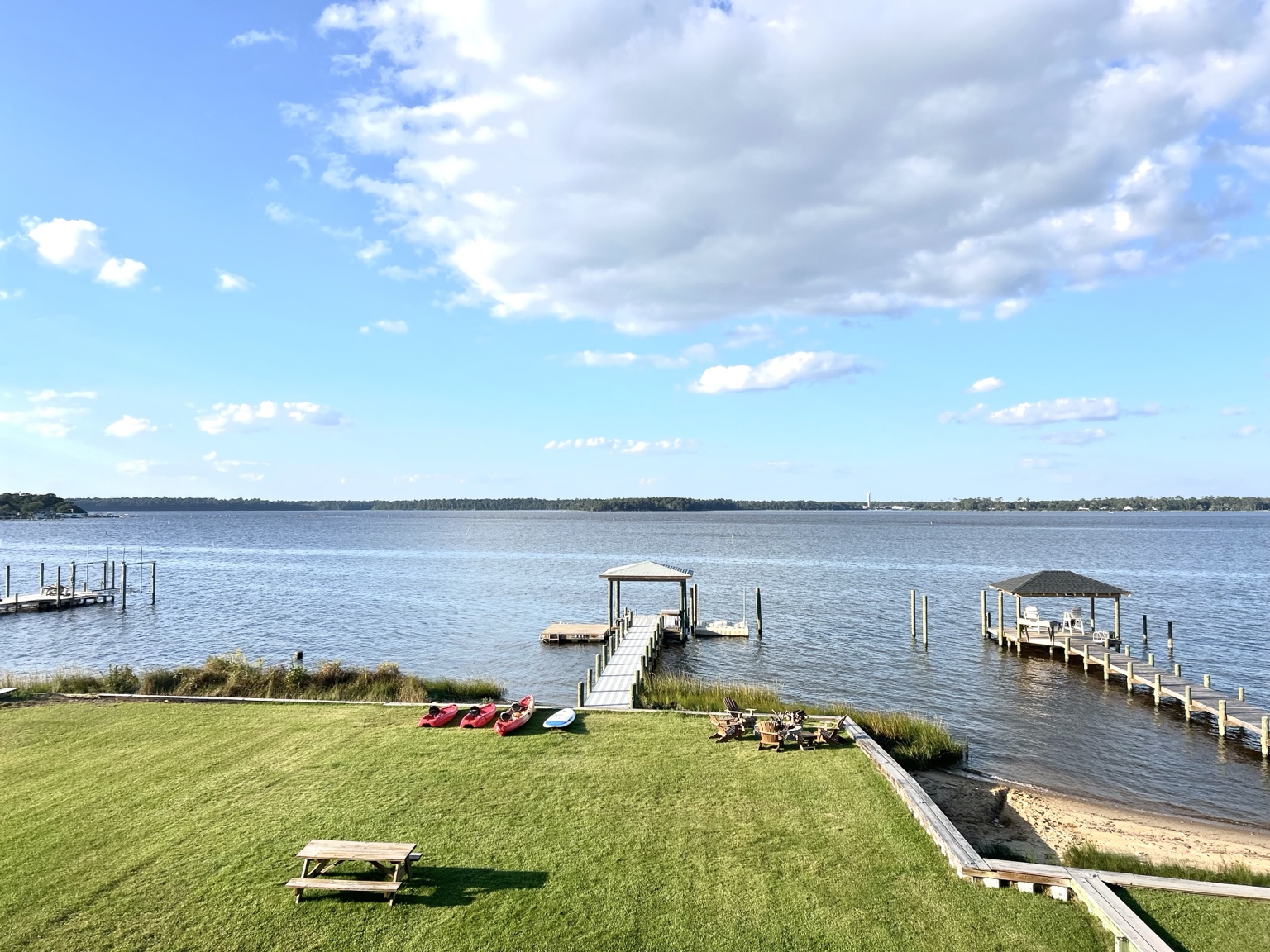 Waterfront lawn and dock at Chad Landing